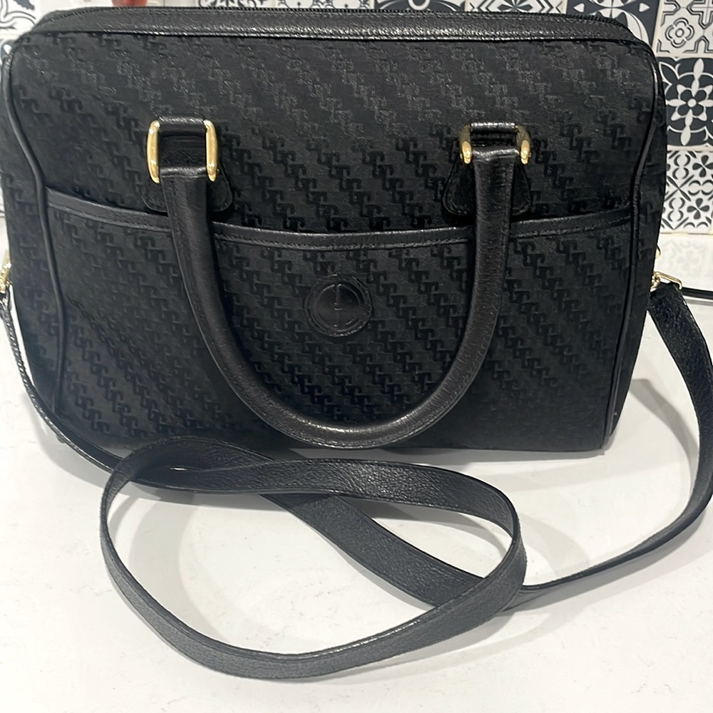 Vintage early 1990’s Gucci satchel in black Gucci print with leather trim